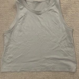 Lululemon cropped tank with “LULULEMON” across the front - size 6, worn once